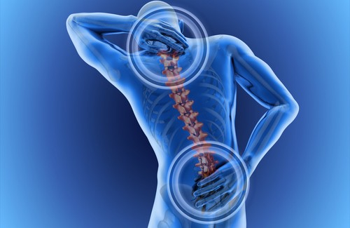man experiencing symptoms of a herniated disc