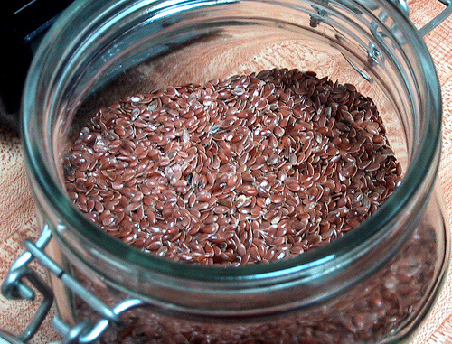 A glass bowl of flaxseed