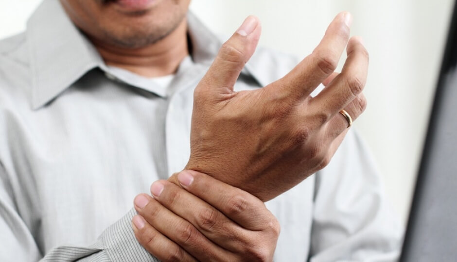 Man suffering with arthritis pain