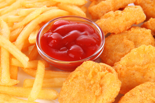 French fries, chicken nuggets, and ketchup.