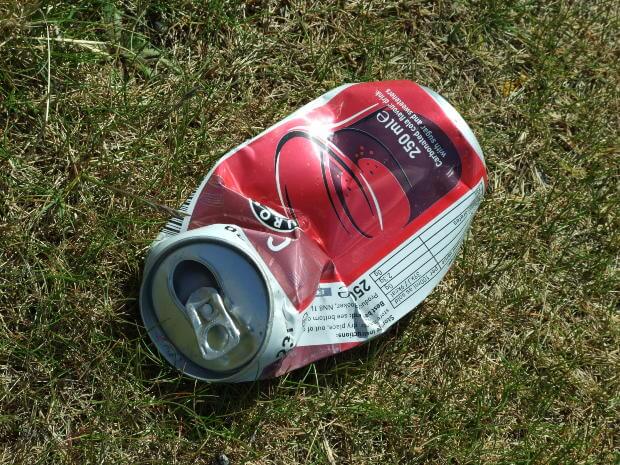 Crumpled can on ground