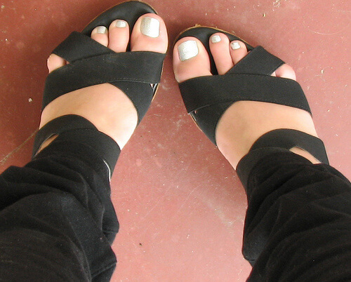 Beautiful feet in black heels
