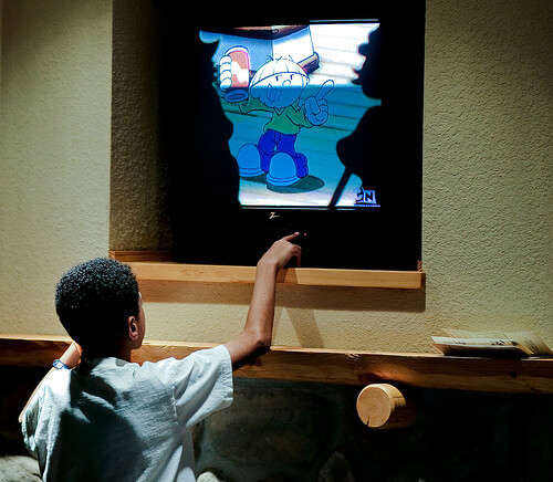 A boy watching cartoons.
