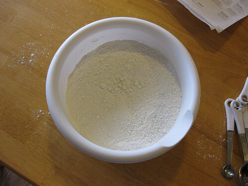 Baking soda in a white container.