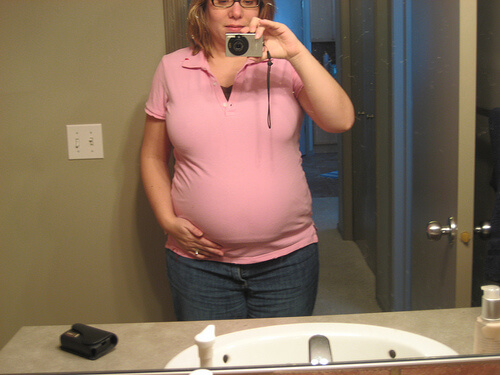 woman taking photo of dark spots