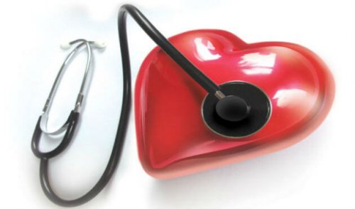 stethoscope checking a heart