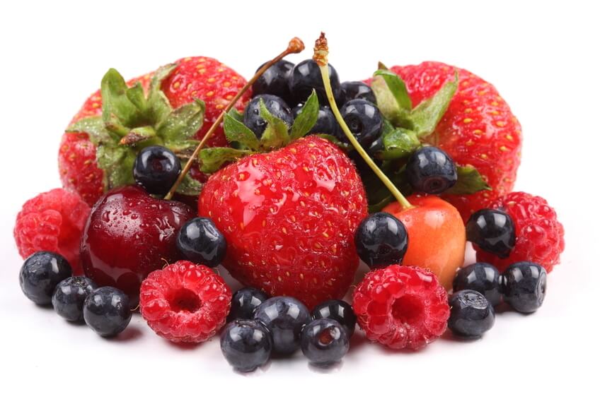 A selection of red and blue fruit