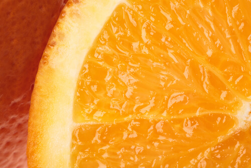A close up of slice of orange.