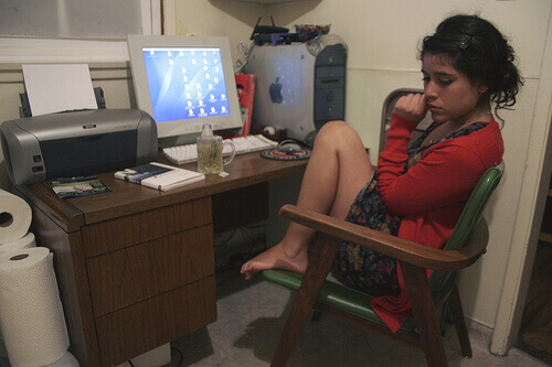 Woman in a ball looking down