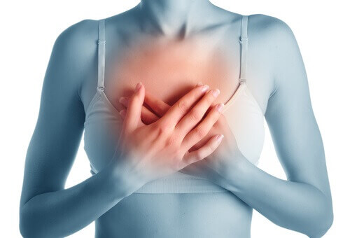 Illustration of woman holding her chest red color indicating chest pain and angina