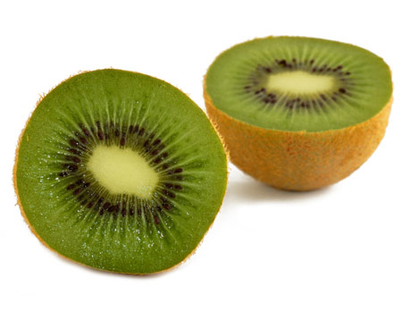 A kiwi fruit cut in two.