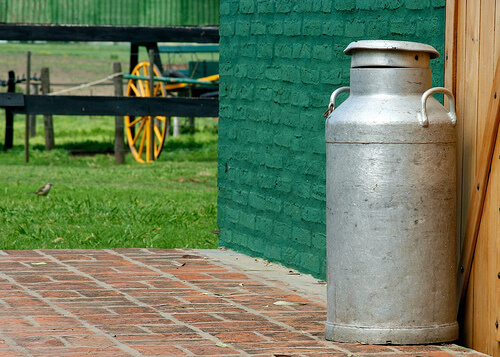 A milk churn on a farm.