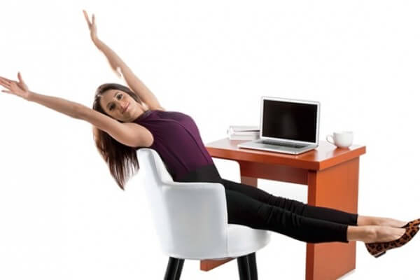 Woman doing sitting exercises to prevent and treat varicose veins