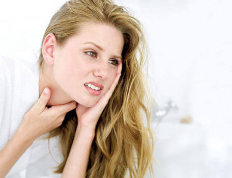 Woman with a sore throat