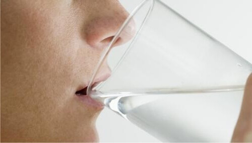 A glass of water.