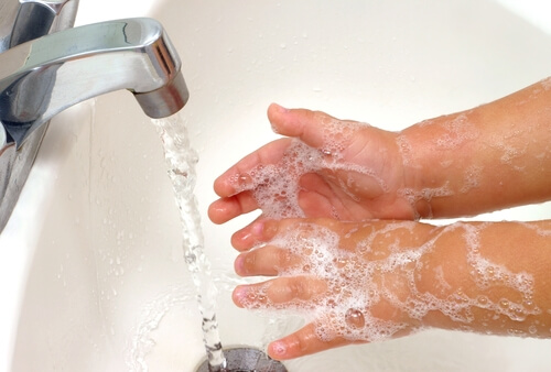 Person washing their hands