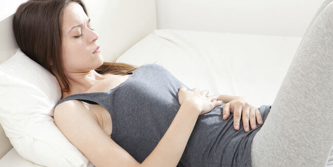 Woman with stomachache