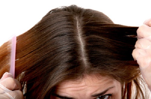 woman-combing-hair-straighten-hair-naturally
