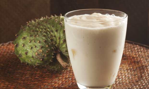 Custard apple or soursop juice with ice
