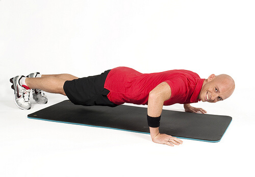 Man doing push-ups on the floor
