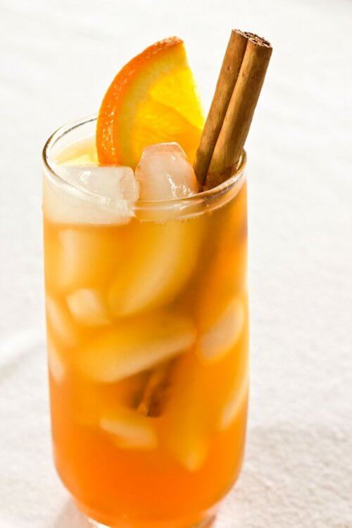 Glass of orange cinnamon tea