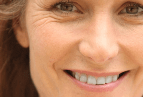 Exercises to tone your face woman's face with wrinkles near eyes