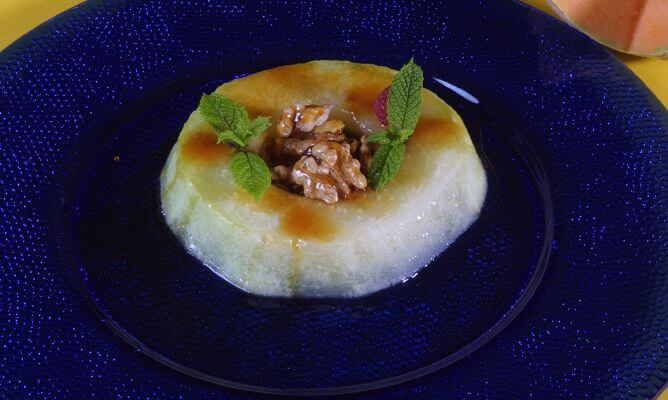 A slice of melon with honey on top