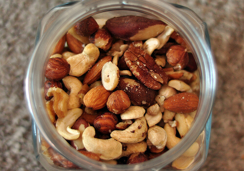 A jar of trail mix to satisfy sweet cravings