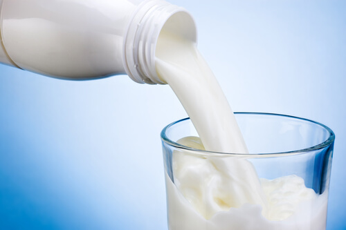 Pouring a glass of milk