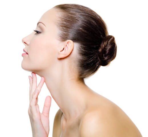 Woman touching her neck