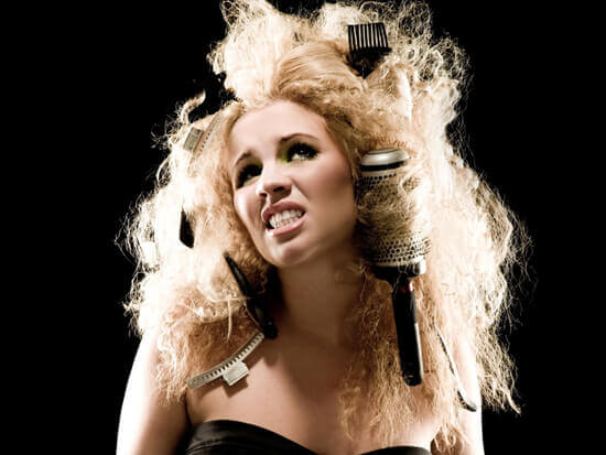 girl with big, blonde. frizzy hair