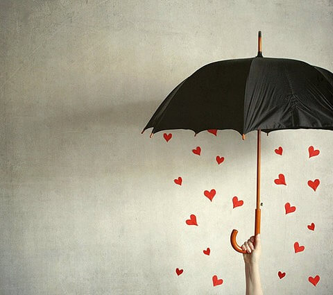 Heart and love rain and an umbrella.