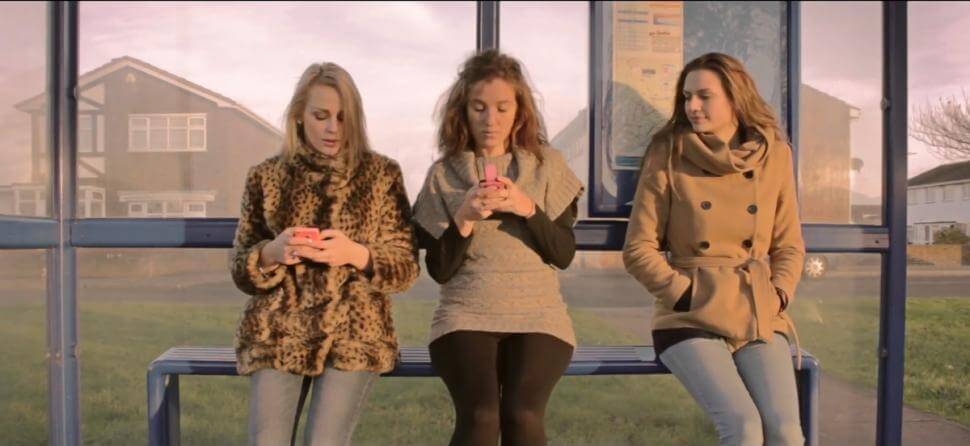 People using their cell phones.