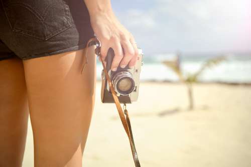 A person holding a camera.
