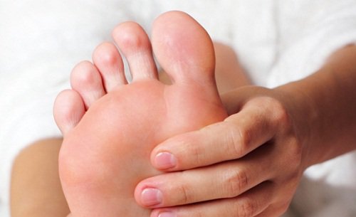foot massage to stop a foot cramp