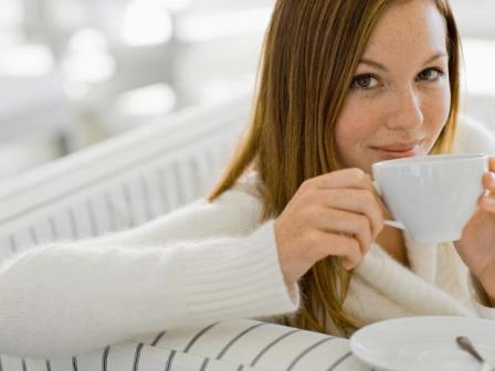 woman drinking raisin water
