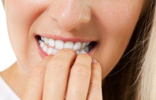 nail-biting close-up