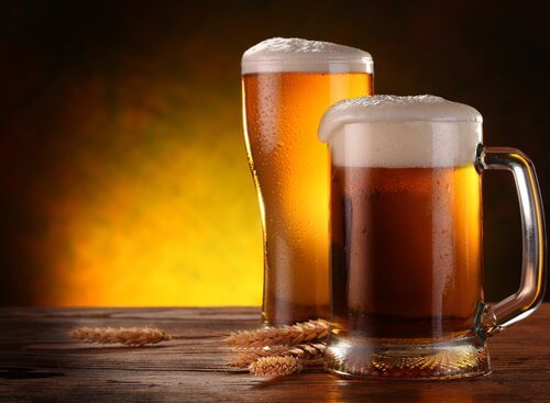 A jug and a glass of beer.