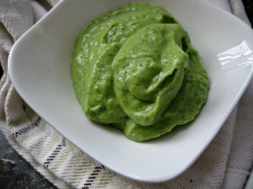 Green puree in bowl natural remedies with avocado
