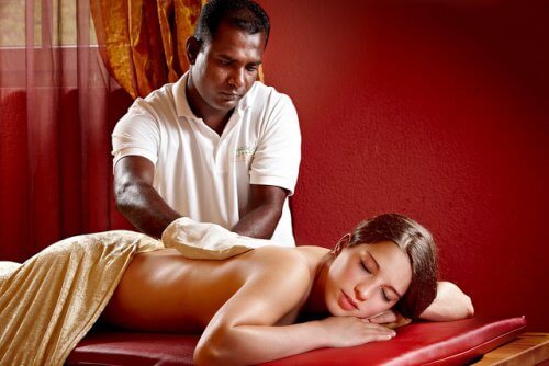 man giving a woman a back massage