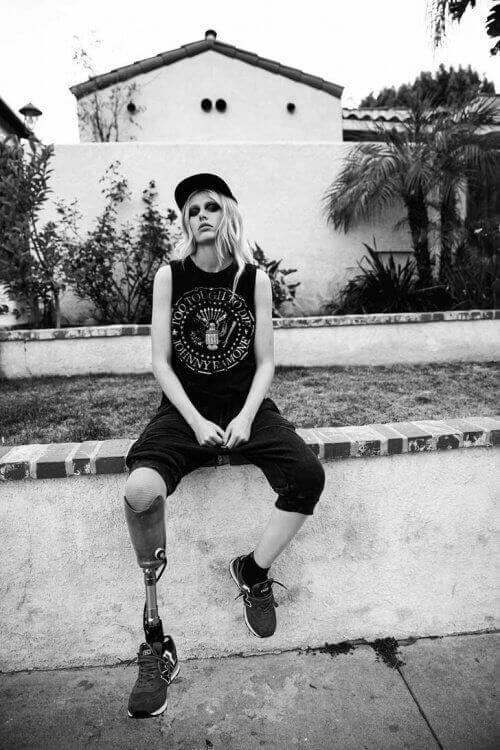 Lauren Wasser posing with a prosthetic leg too tough to die t shirt