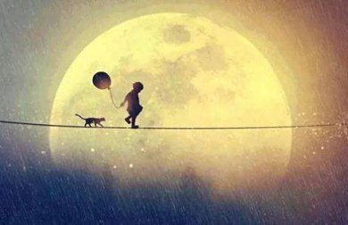 Boy walking along a tight rope