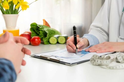 A doctor writing a prescription.