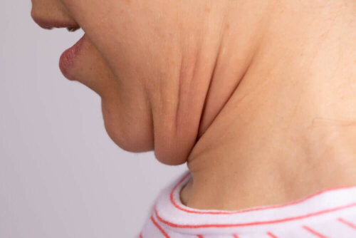 A woman excercizing her chin.