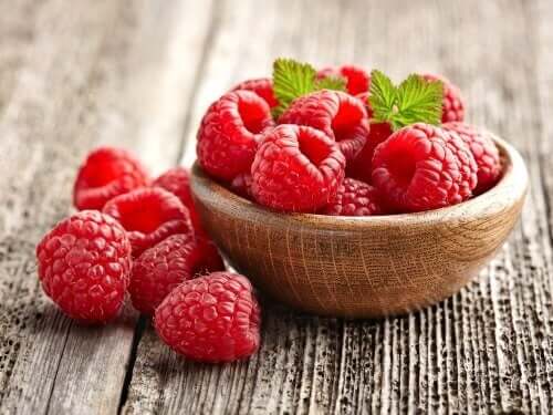 Some raspberries in a bowl.