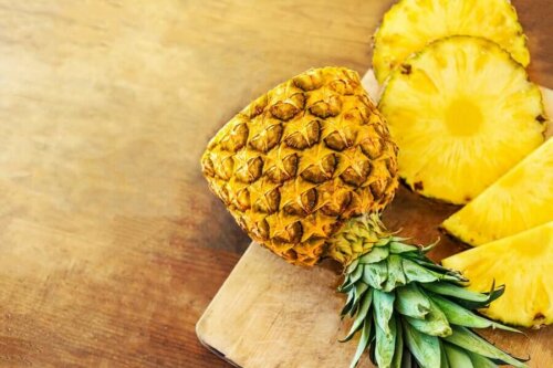 Some sliced pineapple on a cutting board.