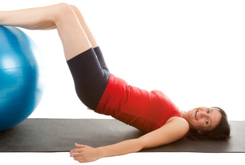 You can improve the appearance of your thighs with leg raises on an exercise ball.