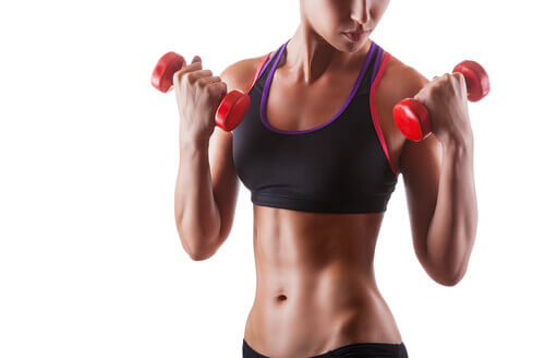 A lady using weights.