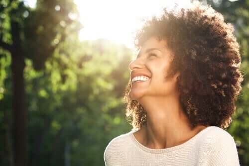 A woman at peace, smiling.