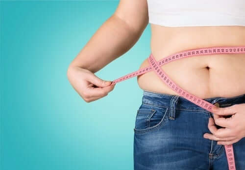 A woman with belly fat.